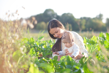 Mother and child in field