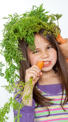 Beautiful little childl with vegetable