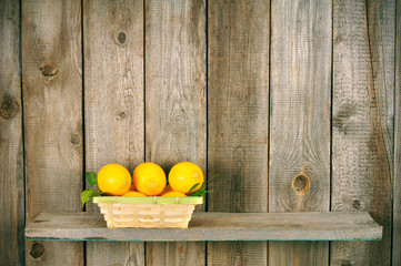 Obraz na płótnie Canvas Lemons in a basket