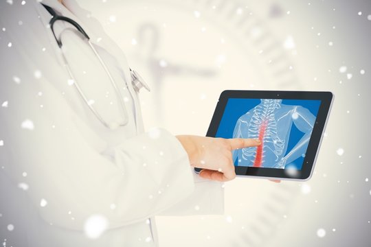 Doctor showing her tablet with red spin