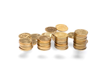 Vertical money stack with scattered coins