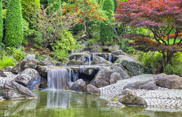Cascade waterfall in Japanese garden in Bonn - obrazy, fototapety, plakaty