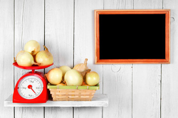 Onions on scales and in a basket