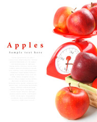 Apples on scales and in basket