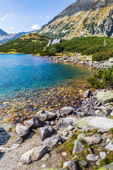 Naklejka na ściany i meble Mountain lake in 5 lakes valley in Tatra Mountains, Poland.