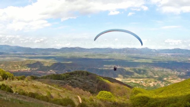 Paragliding over the mountain range