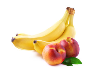 Ripe bananas and peaches on white.