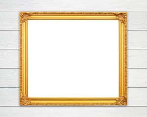 blank golden frame on wood wall