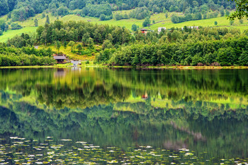 Fototapeta na wymiar Beautiful Norwegian landscape with water reflection