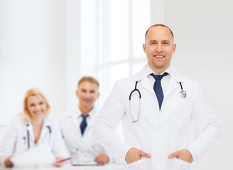 Fototapeta na wymiar smiling male doctor with stethoscope
