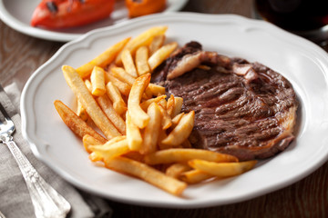Beef steak with French fries