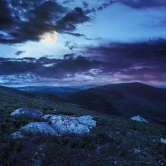 stones on the hillside at night