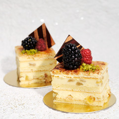 Slices of cake with berries and chocolate © dmitryabaza