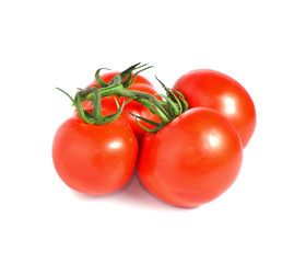 bunch of red tomatoes isolated on a white background