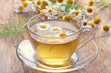 Herbal tea with chamomile flowers