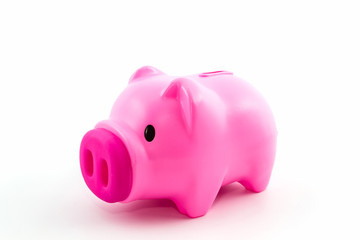 Pink piggy bank saving.
