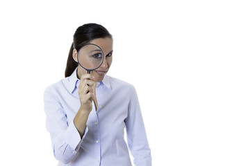 smiling young woman with magnifying glass