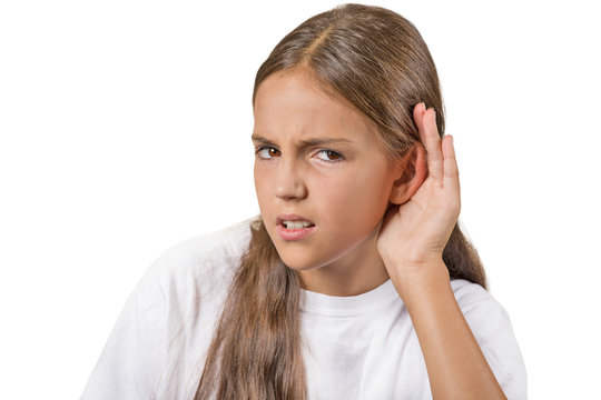 Unhappy hard of hearing young girl asking to speak up