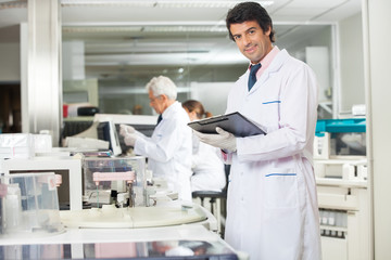 Male Technician With Clipboard