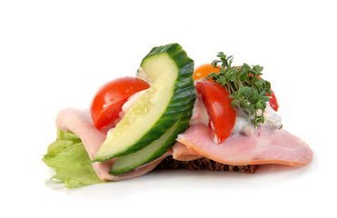 Danish open sandwich with ham, italian salad and cress.
