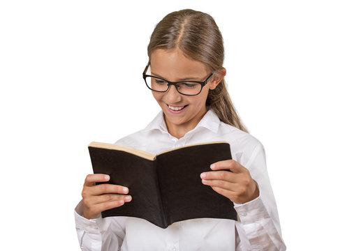 Girl with glasses reading book isolated on white background 
