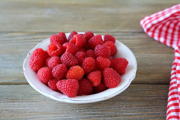 fresh juicy raspberries in a bowl