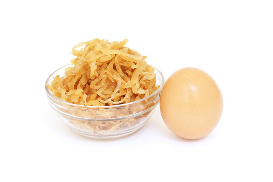 pickled  turnip and egg on white background