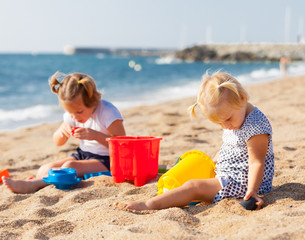  girls playing on the beach