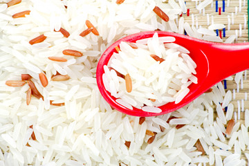 Grain rice in a red color  spoon