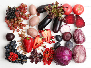Fresh organic vegetables on wooden table, close up