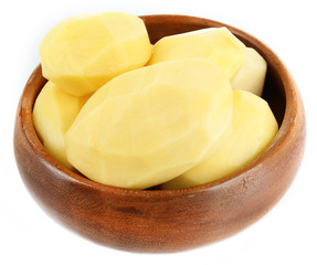 Raw peeled potatoes in bowl isolated on white