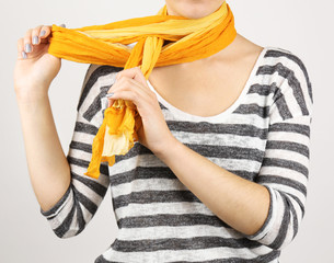Naklejka premium Woman wearing scarf close up
