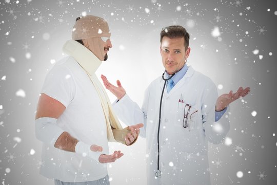 Portrait Of A Doctor With Patient Tied Up In Bandage