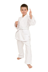 boy in white kimono posing