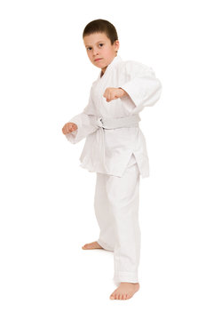 boy in white kimono posing