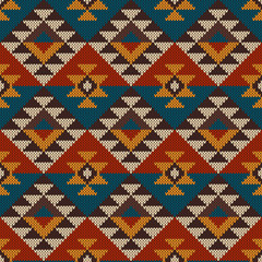 Traditional Tribal Aztec seamless pattern on the wool knitted te