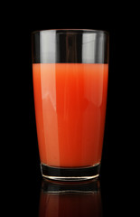 Studio shot of grapefruit juice isolated on black