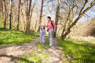 Mother and daughter is hiking