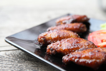 Fried chicken on wood background