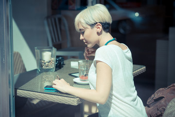 beautiful young blonde short hair hipster woman