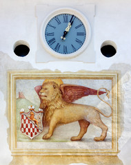 Venetian Lion and Clock on Town Gate in Spilimbergo, Italy