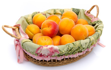 Ripe apricots in a basket