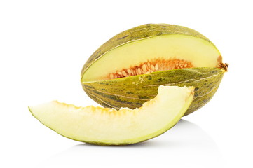 Piel de sapo green melon with slice isolated white