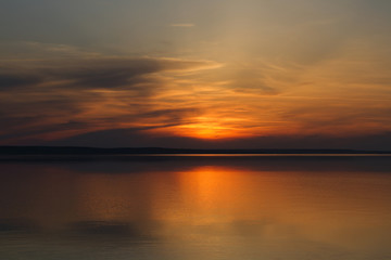 Fototapeta na wymiar sunset on a river