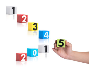 Colorful plastic of year numbers on a white background