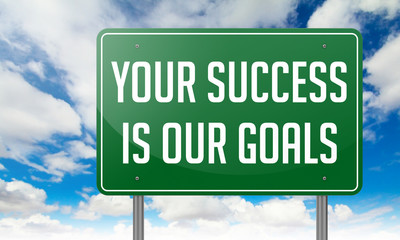 Your Success is Our Goals on Highway Signpost.