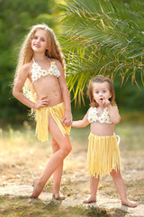 portrait of two sisters in tropical style © zagorodnaya