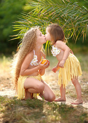 portrait of two sisters in tropical style © zagorodnaya