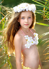 portrait of little girl in tropical style © zagorodnaya