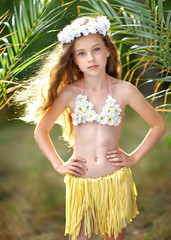 portrait of little girl in tropical style © zagorodnaya